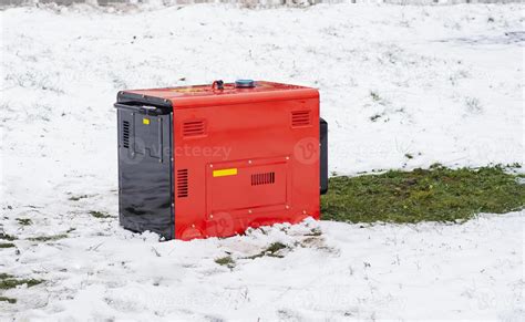 Portable electric generator running in the cold winter.Energy genocide