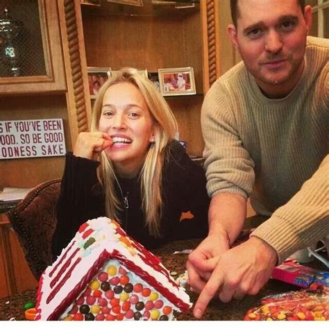 Michael Buble and his wife decorating ginger bread homes last week ...