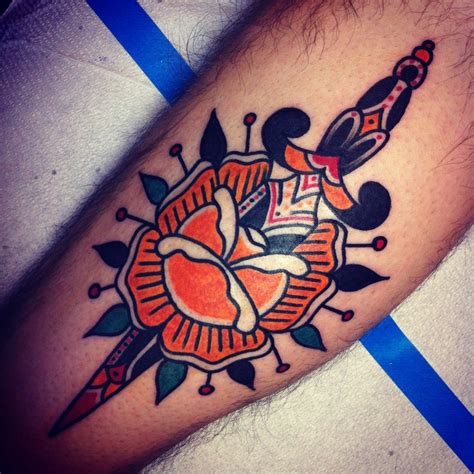 Orange rose tattoo by Josh Stephens