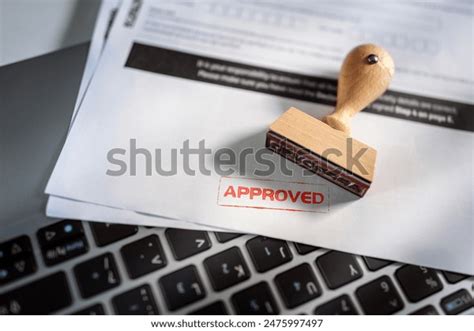 approved stamp  application form business stock photo