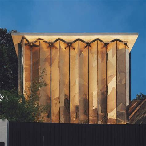 S Lab10 Hides Office Behind Golden Folding Facade In Kuala Lumpur Workplace Design Facade