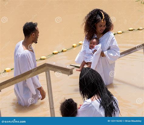 Christian Pilgrims Being Baptised In The River Jordan Editorial