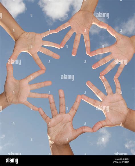 Hands Together Against The Sky Stock Photo Alamy