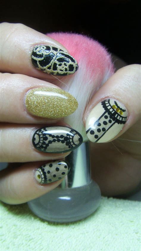 Black and gold nails