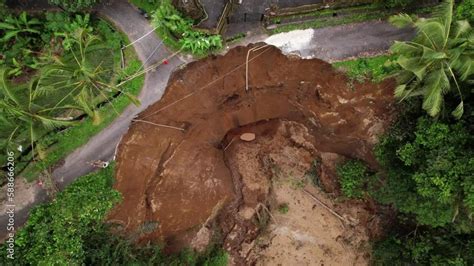 Destruction Of Road Caused By Dangerous Landslide Top Down Aerial Shot