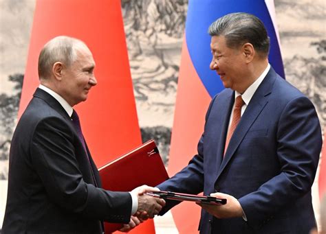 Xi Putin Hail Ties As Stabilising Force In Chaotic World The Star