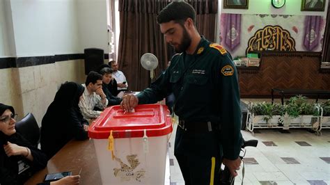 Iran Holds Runoff Presidential Vote Pitting Hard Liner Against