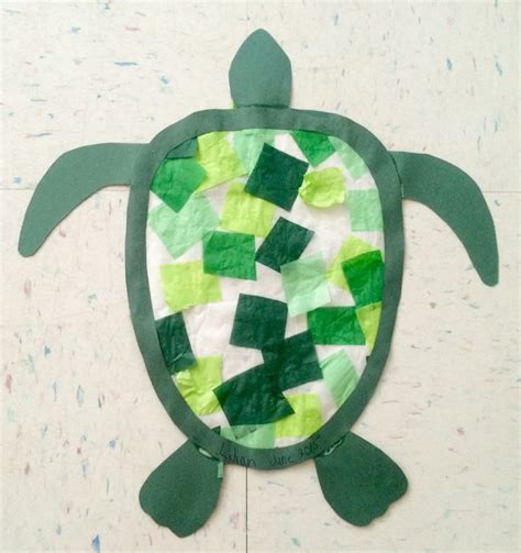 A Paper Plate Turtle Made To Look Like It Is Swimming