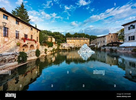 Thermal bath town of Bagno Vignoni, Italy during sunrise. Old thermal ...