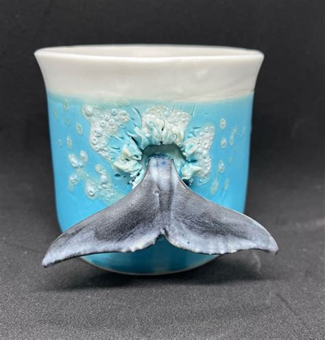 Humpback Whale Plunging Into A Cup