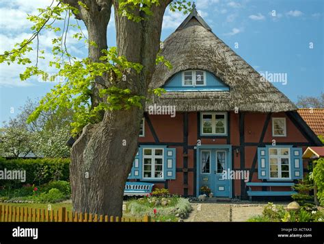 Typical House With A Thatched Roof At Wustrow Fischland Germany Stock