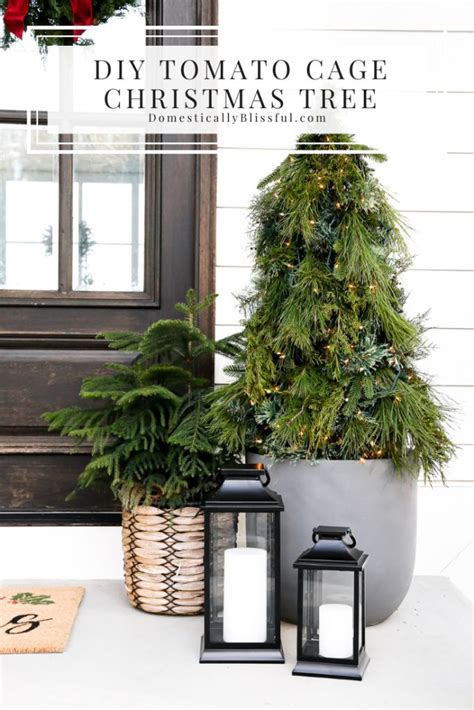 Two Christmas Trees Sitting Next To Each Other In Front Of A Door