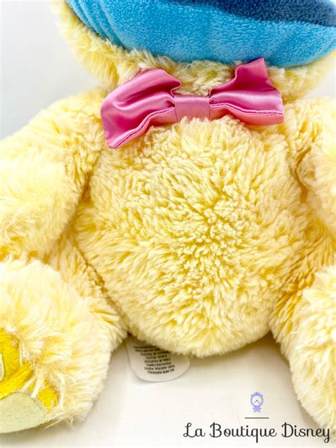 Peluche Stitch Pâques Disney Store 2021 monstre bleu lapin jaune 30 cm