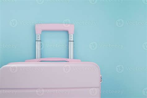 Pink luggage on blue background 26394185 Stock Photo at Vecteezy