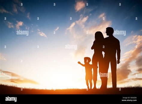 happy family  parents    child  sunset stock