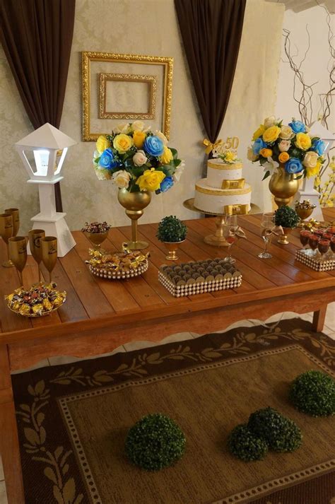 A Wooden Table Topped With Lots Of Cakes And Desserts On Top Of Each Other