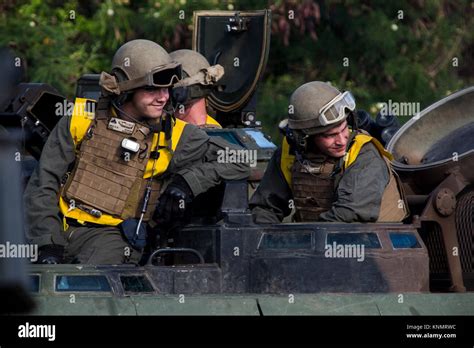 Marines With Combat Assault Company 3rd Marine Regiment Stand By To Execute A Long Range Swim