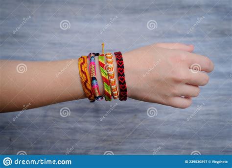 Friendship Bracelet on the Hand Women Stock Image - Image of hand, beautiful: 239530897