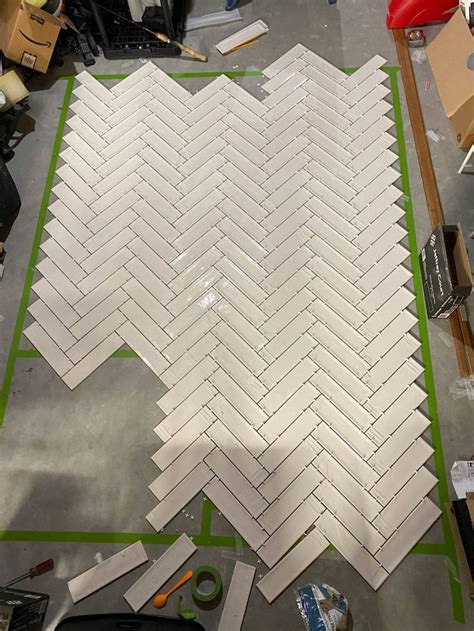 Tiling A Bathroom Wall In A Perfect Herringbone Pattern The