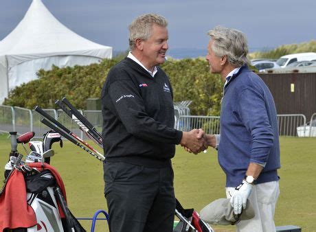 Colin Montgomerie Meets Michael Douglas On Editorial Stock Photo