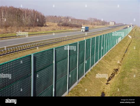 High Sound Absorbing Barriers Separating The Highway From The