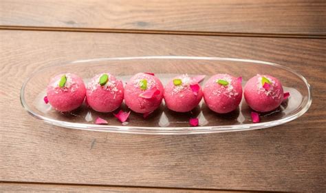 Premium Photo Delicious Pink Chumchum Or Rose Flavour Cham Cham Or Rasgulla Or Rasagola