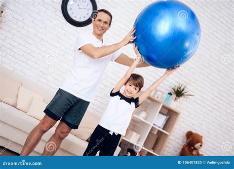 Father and Son are Engaged in Fitness Together with Fitball. Stock Photo - Image of health, body ...