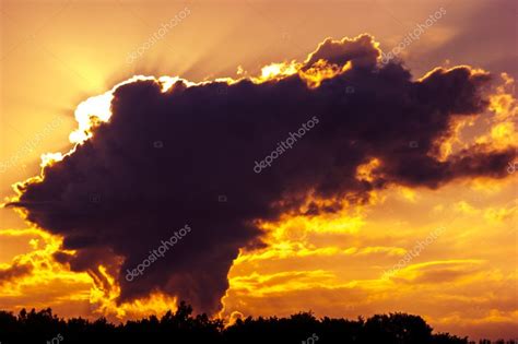 Dark sky with storm clouds during sunset — Stock Photo © masterwilu ...