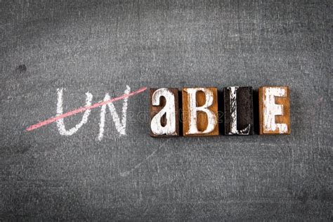 unable   concept words   black chalk board stock photo