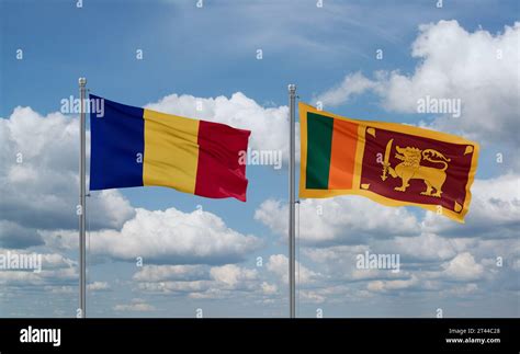 Sri Lanka And Romania Flags Waving Together In The Wind On Blue Cloudy