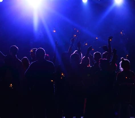 Premium Photo | Crowd of people at night open air festival