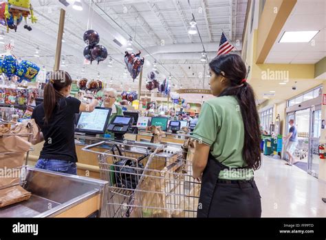 Cashier Working Employee Worker Customer Hispanic Hi Res Stock