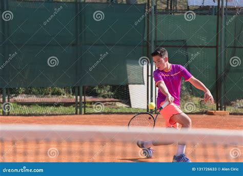 Young Tennis Player Hitting the Ball by Forehand Stock Image - Image of ...