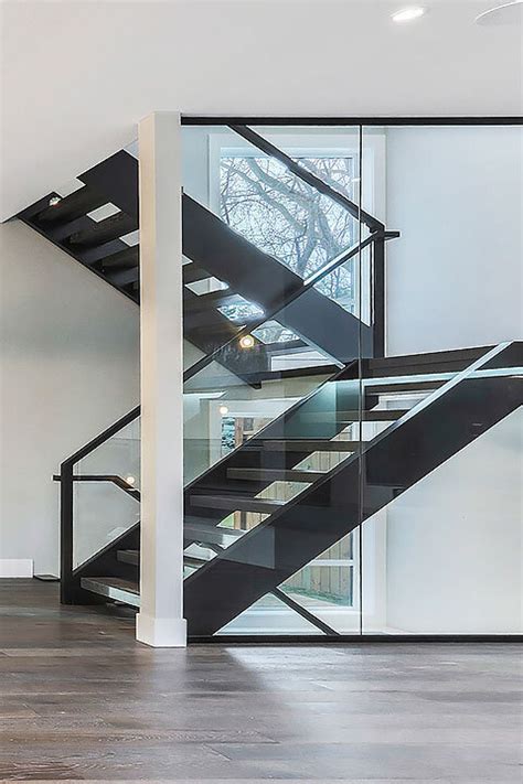 New Home with Glass Wall Staircase - Artistic Stairs and Railings