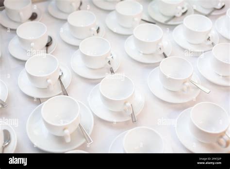 Many Rows Of White Ceramic Coffee Or Tea Cups Lines Of Coffee Cups In