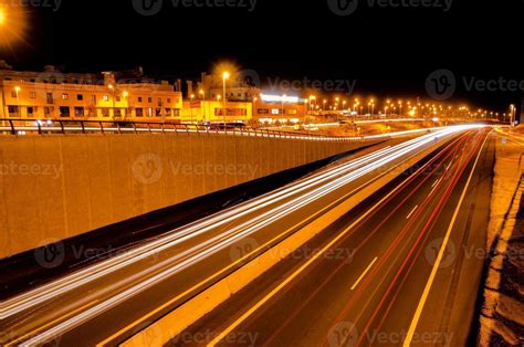 Highway at night 20757218 Stock Photo at Vecteezy