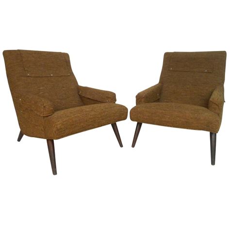 Pair Of Unique Mid Century Modern Lounge Chairs With Ottomans For Sale