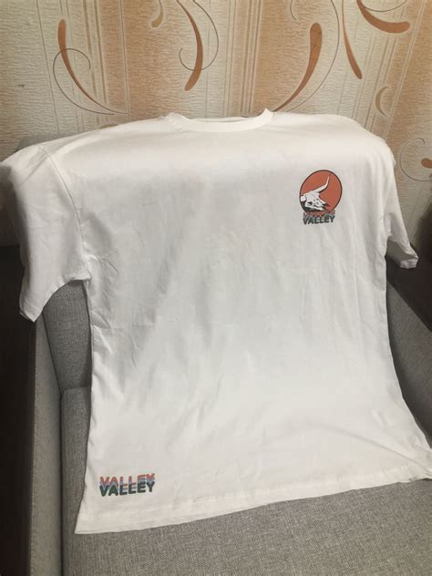 Продам новую футболку