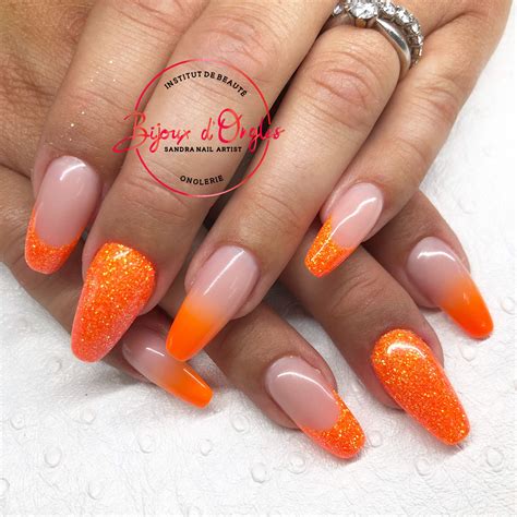 Ongles gel avec babyboomer et pailletés orange fluo Ongles Nails Baby