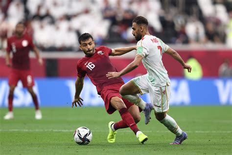 Winning start for Qatar, Iraq fight back to hold Oman