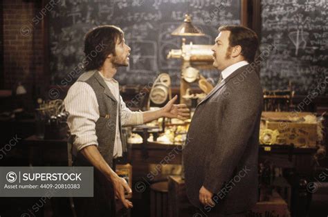 GUY PEARCE and MARK ADDY in THE TIME MACHINE (2002), directed by SIMON ...