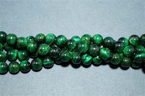 Тигровый глаз тон.зеленый шар - "Твой Камень"