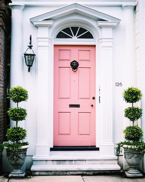 Pink Door And Topiaries Welcome Doors Home Front Door Pink Front Door