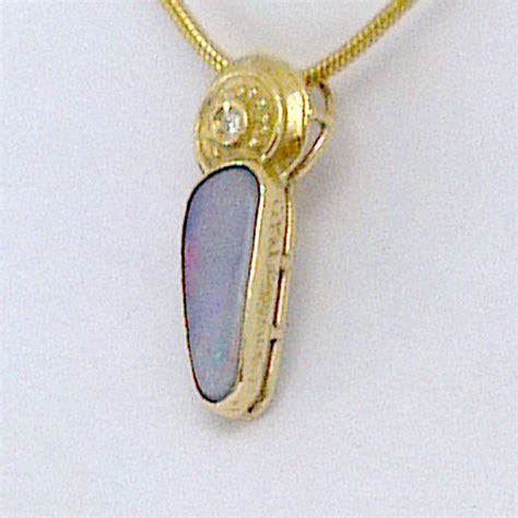 Australian Black Fire Opal Pendant in Solid 18 Carat Gold Set - Etsy