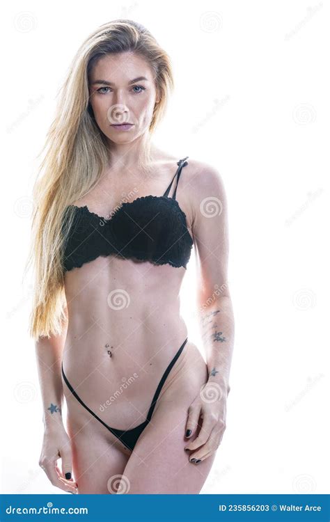 Blonde Lingerie Figure Model In A Studio Environment Stock Image