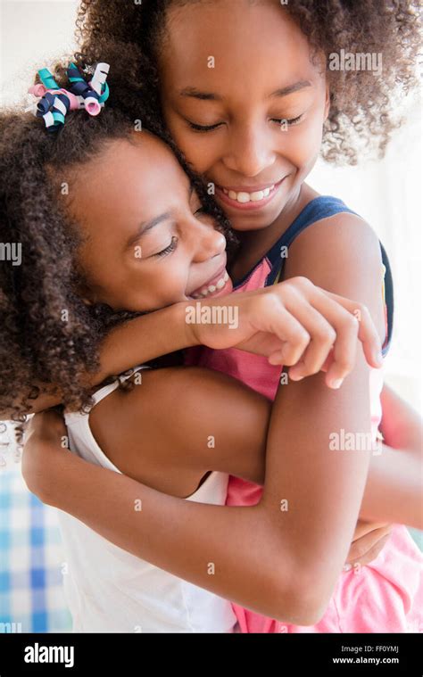 African American Sisters Hugging Hi Res Stock Photography And Images