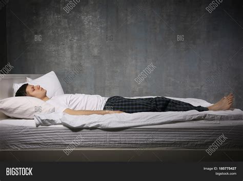 Young Man Sleeping Bed Image & Photo (Free Trial) | Bigstock