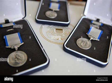 The Three Coast Guard Silver Lifesaving Medals Presented To Doug