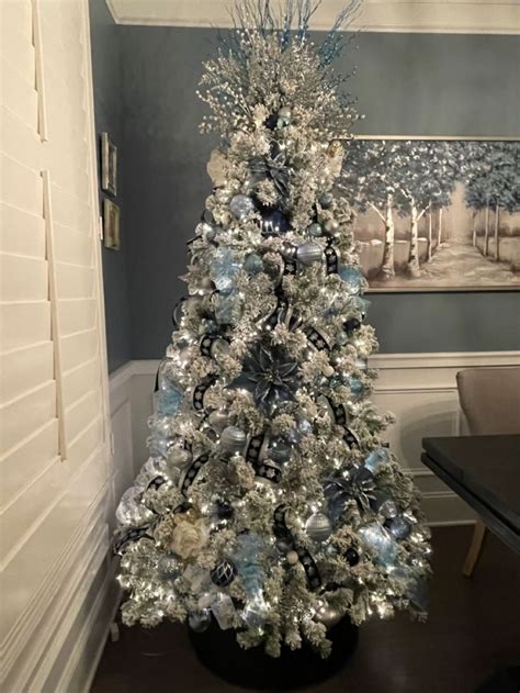 Blue and Silver Christmas Tree | Christmas tree colour scheme, Amazing ...