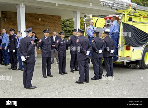 Funeral procession for a fire chief: a fire engine acted as hearse and ...